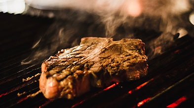 Steak on a Charcoal Grill